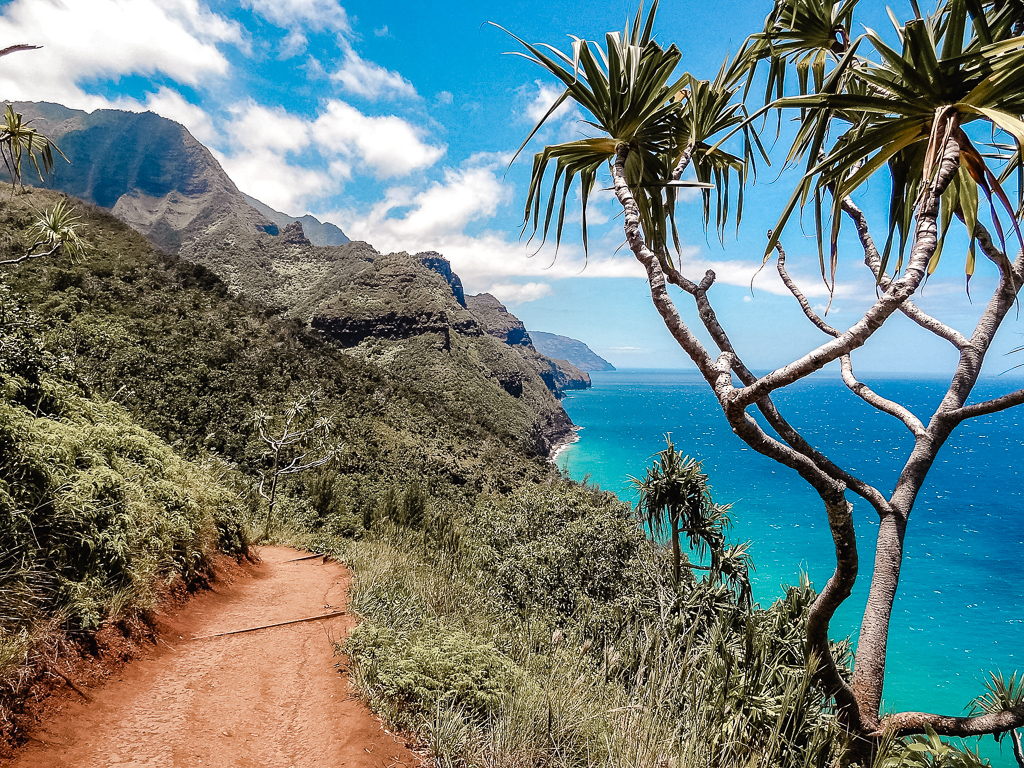 Hiking the Kauai coastline in Hawaii