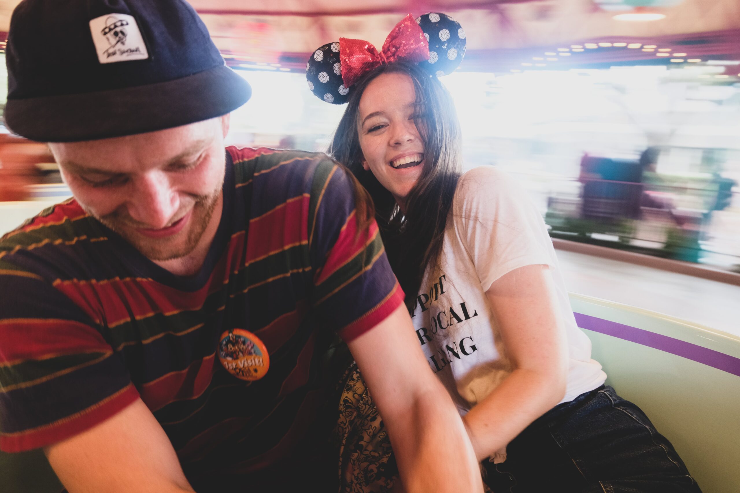 Two people on the teacups in Magic Kingdom